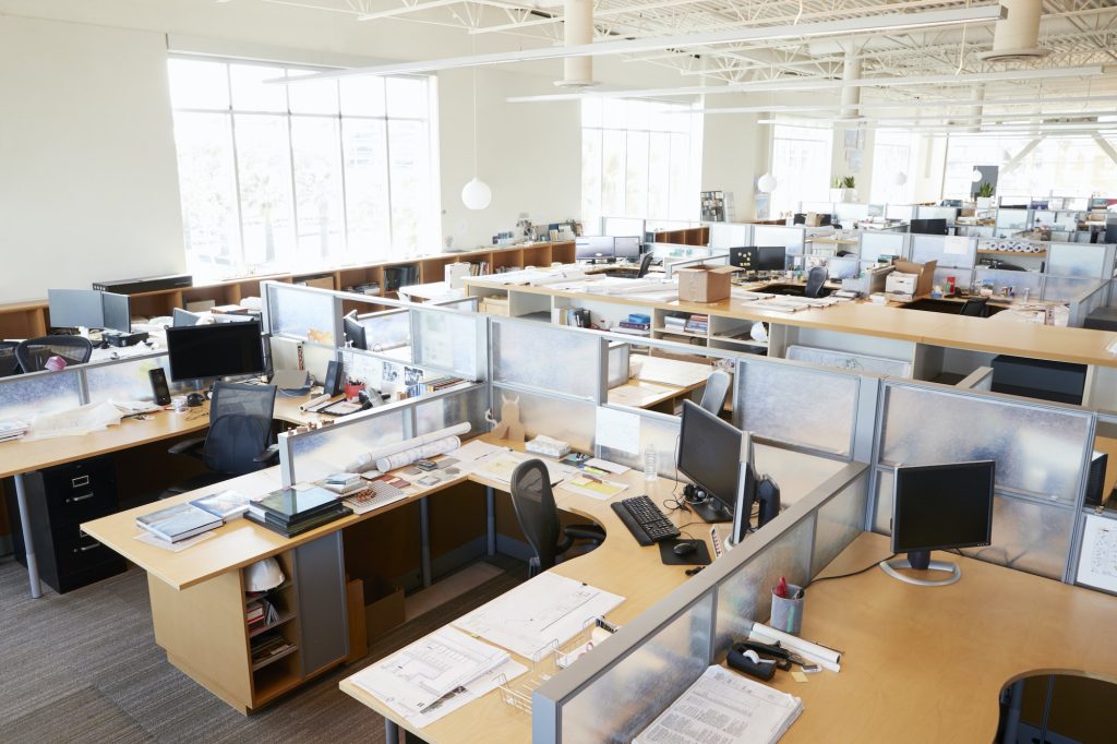 Partitioned computer workstations in an open plan office
